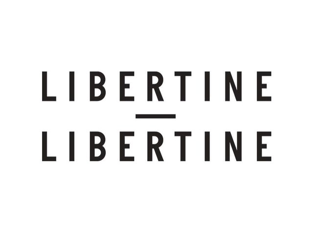 Texte noir lisant "LIBERTINE" deux fois avec une ligne horizontale entre les deux instances, sur un fond blanc. Le texte est présenté dans une police en gras, sans-serif.