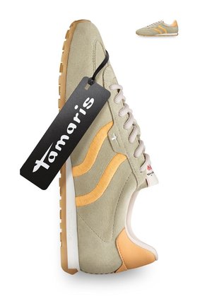 Beige and orange suede sneaker with white laces and gum sole, featuring a black "Tamaris" brand tag attached to the side.