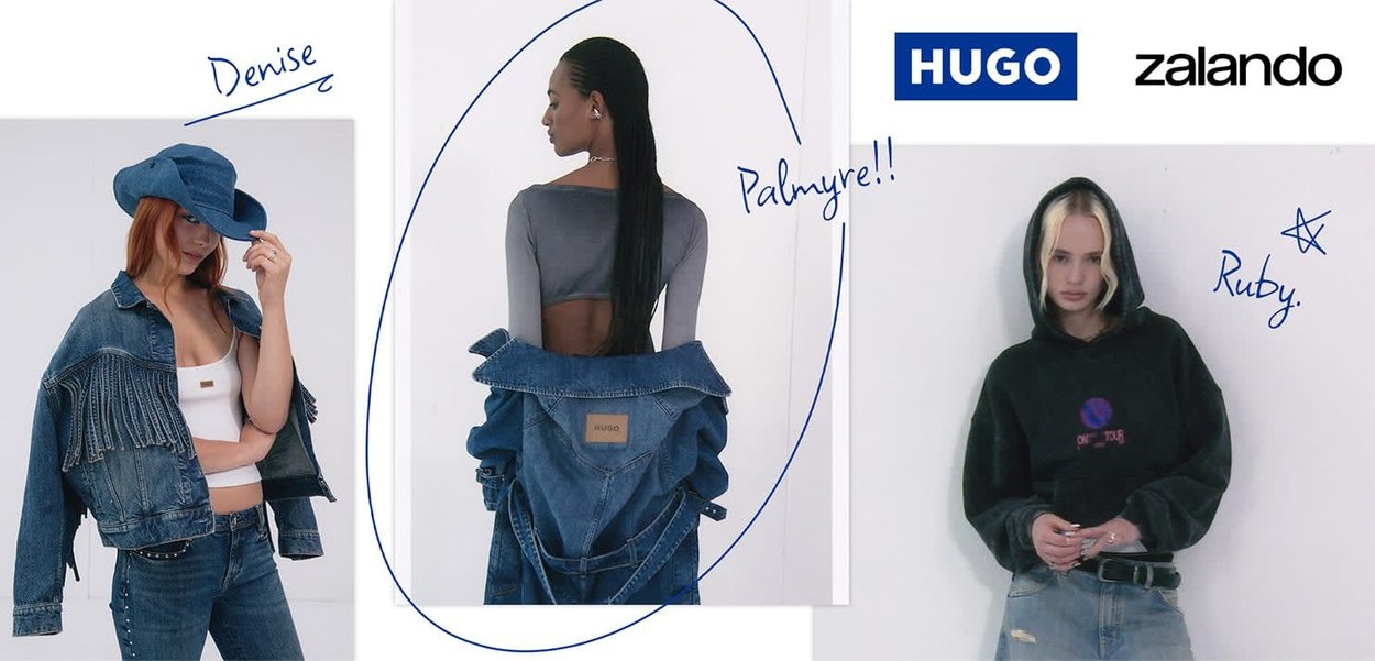 Trzy modelki prezentują odzież: niebieską dżinsową kurtkę z frędzlami, szary top crop oraz czarną bluzę z kapturem z graficznym logo. Każda stylizacja jest casualowa.