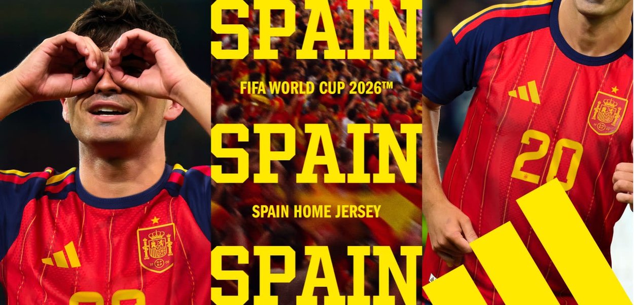 La camiseta local de España para la Copa Mundial de la FIFA 2026 se muestra en jugadores celebrando, con colores rojo y marino con acentos amarillos y el escudo de España.