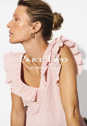 Pink ruffled dress made of textured fabric, featuring a wide neckline and layered frills along the edges. Modern and elegant design.