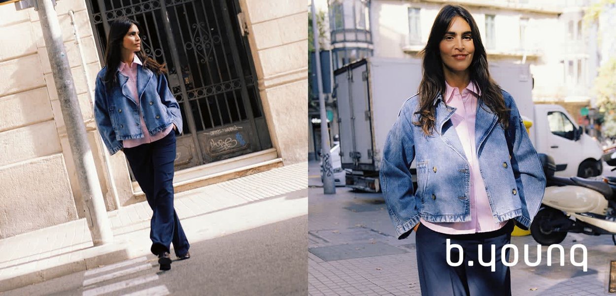 Jeansjacke mit doppelreihigen Knöpfen, darüber ein hellrosa Hemd getragen, kombiniert mit marineblauen Hosen. Verfügt über eine legere, entspannte Passform.