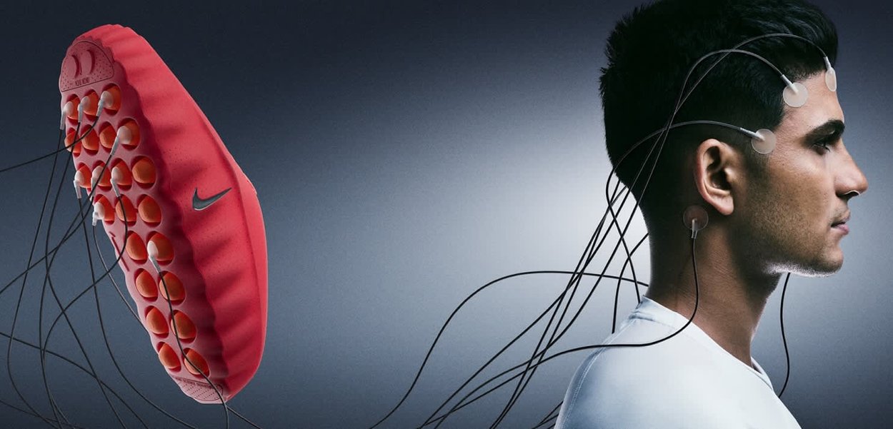 Zapato Nike rojo con agarres circulares y logo negro, junto al perfil de una persona con cables y electrodos adheridos a su cabeza.