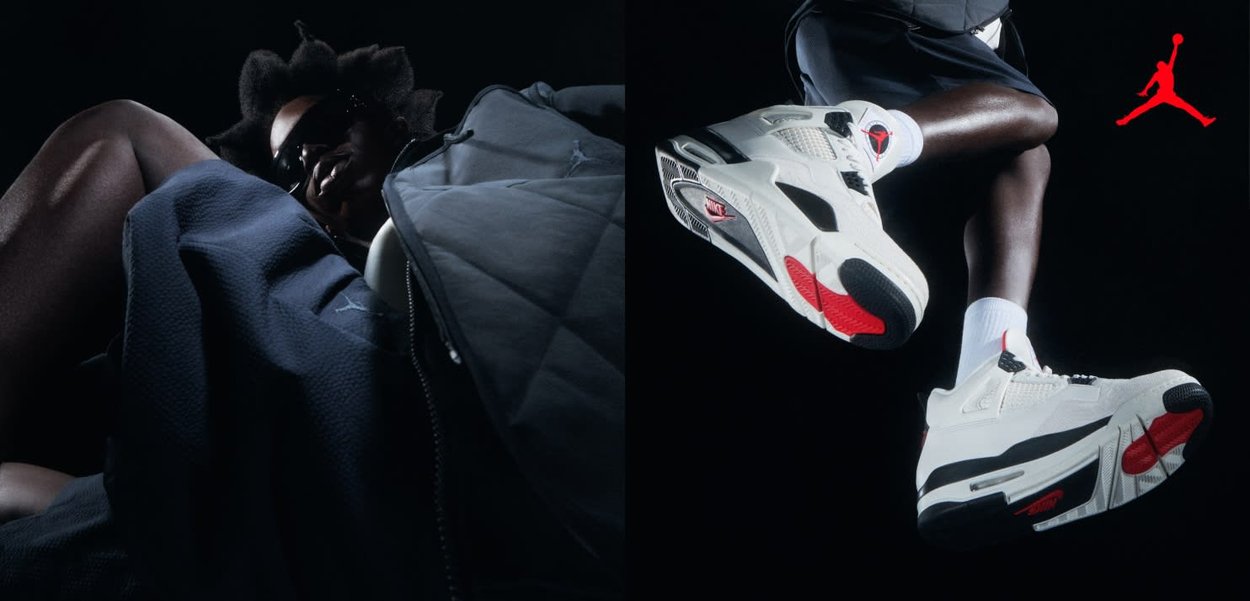 Persoon met zonnebril en een donker jack links; benen met witte en rode Air Jordan sneakers halverwege een sprong rechts tegen een zwarte achtergrond.