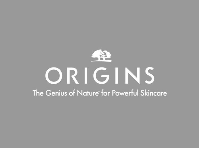 Origins skincare-logo met twee bomen boven de merknaam en de slogan "De genialiteit van de natuur voor krachtige huidverzorging" op een grijze achtergrond.