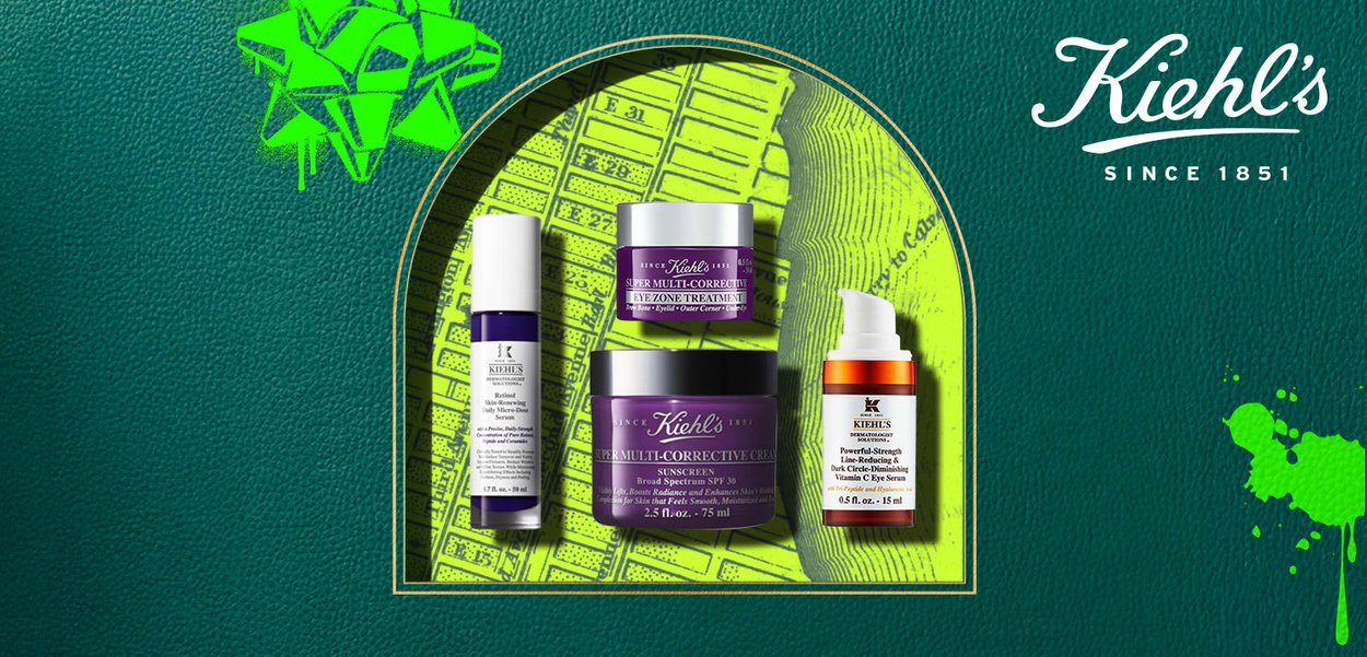 Quattro prodotti skincare Kiehl's: una crema per gli occhi viola, una crema solare bianca, una crema correttiva viola e un siero arancione su uno sfondo verde testurizzato.