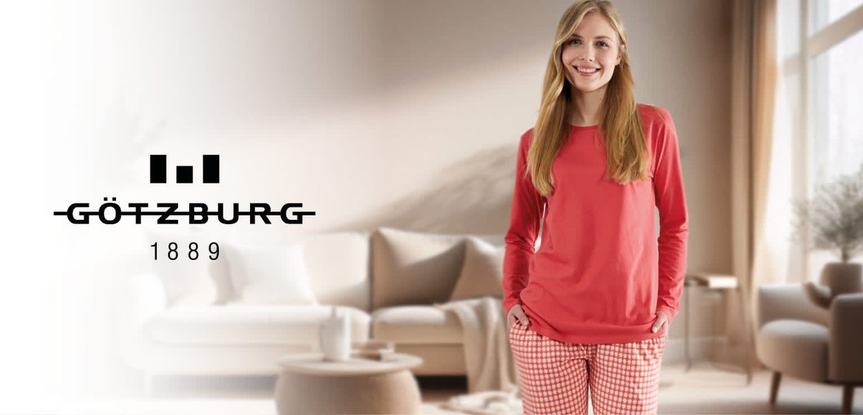 Red long-sleeve top with a relaxed fit paired with checked pajama pants. The fabric appears soft, and the patterns are evenly distributed.