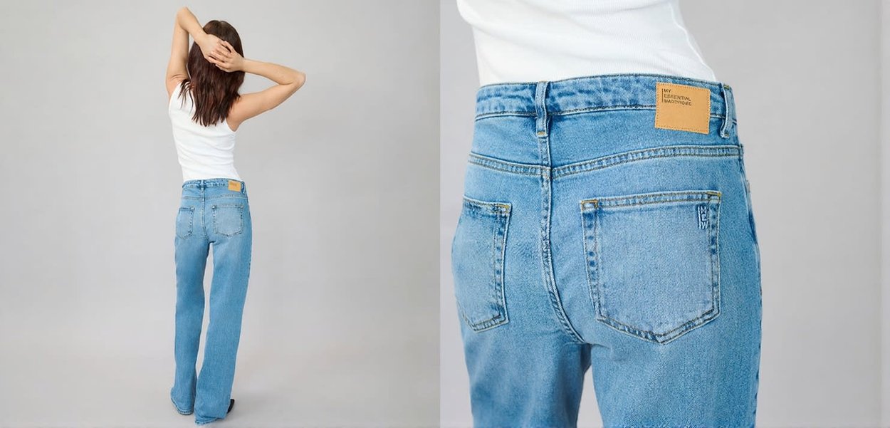 Vaaleansiniset farkut suoralla lahkeella, joissa on vaalea nahkainen etiketti, kaksi takataskua ja haalistuneita yksityiskohtia.