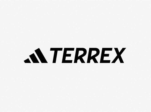 Sort tekst "TERREX" i en fed sans-serif skrifttype, med et trekantet logo bestående af tre sorte trekanter til venstre. Enkel, ren design.