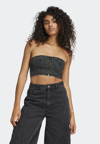 Zwarte denim strapless crop top met een voorkant rits, met een aansluitend ontwerp en een soepele textuur. Gecombineerd met high-waisted wide-leg jeans.