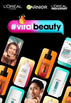 Divers produits de soin affichés sur un fond noir, mettant en avant des emballages et étiquettes colorés de L’Oréal, Garnier et de sérums de soin.