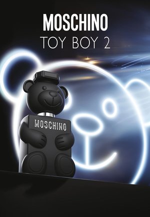 Flacon de parfum en forme d'ours noir avec une finition brillante. Logo "Moschino" sur le devant. Entouré de lignes douces lumineuses et d'un graphique d'ours.