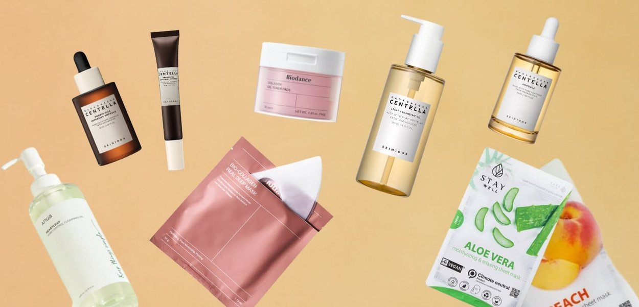 Produits de soin de la peau variés, comprenant des huiles, des masques et des patchs dans différents contenants. Les couleurs incluent transparent, ambre, rose et vert.