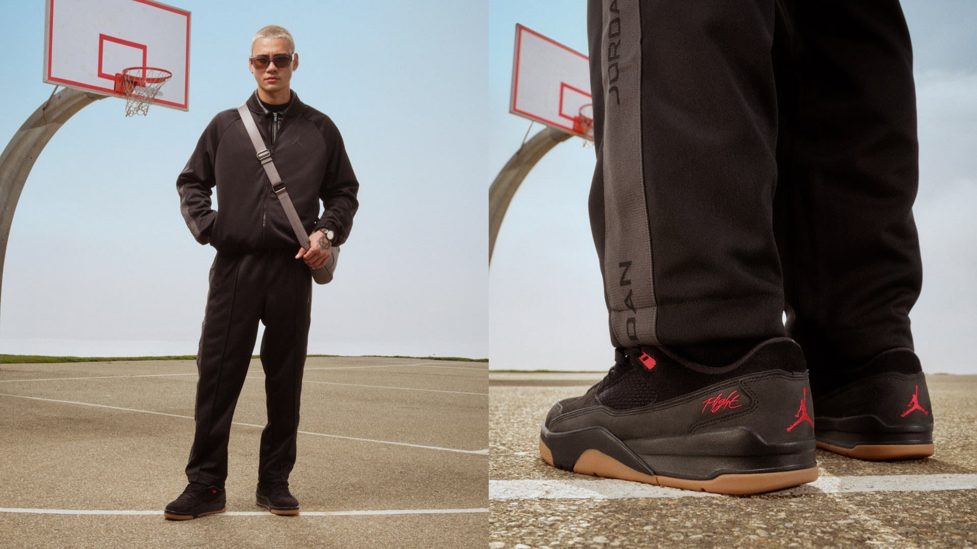 Survêtement de sport noir avec des accents gris, baskets montantes avec des détails rouges et une semelle en caoutchouc, debout près d'un panier de basket sur un terrain.