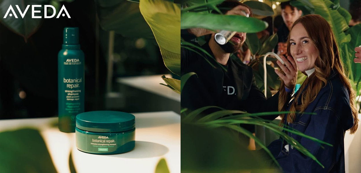 Green shampoo bottle with a blue cap and matching jar. Both have "botanical repair" text. Smooth texture, minimalist design.