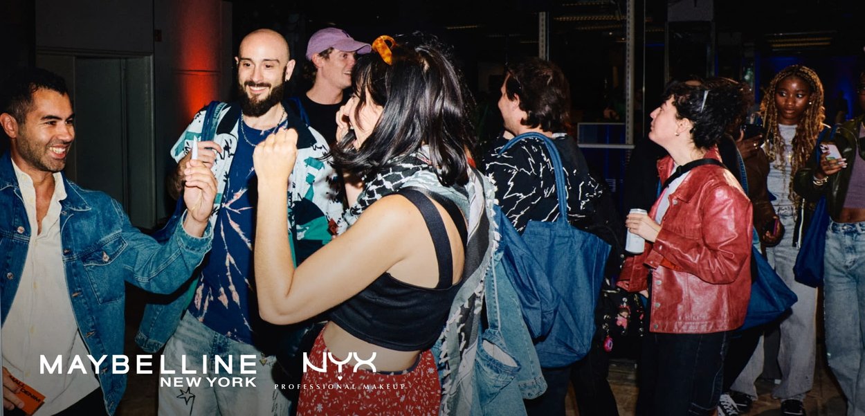 Group of young people socializing indoors, some dancing, wearing casual and colorful clothing, with Maybelline and NYX logos at the bottom.