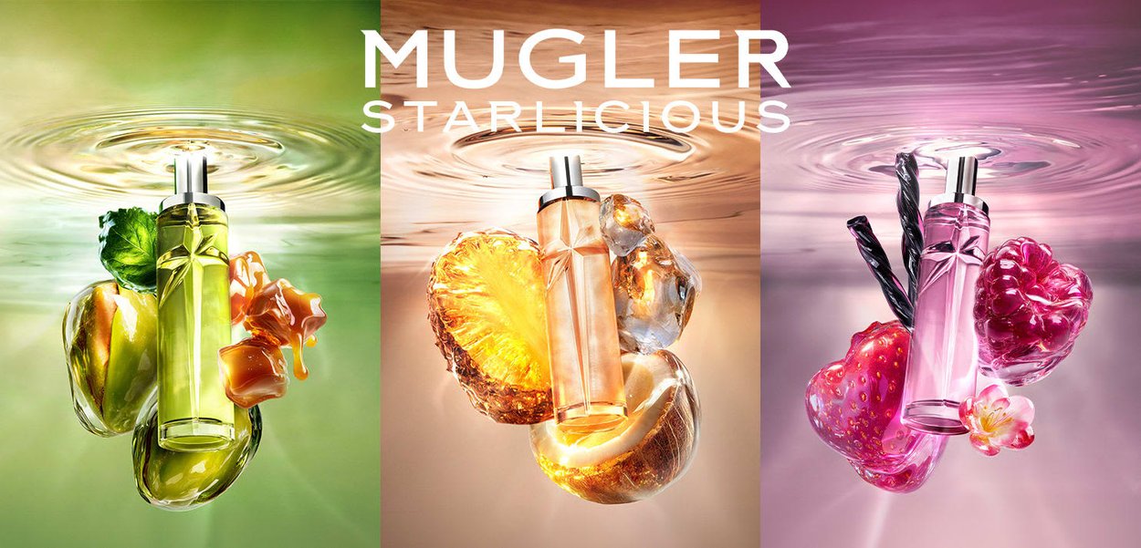 Drei Mugler Starlicious Parfümflaschen umgeben von passenden Früchten und Vanilleschoten, jeweils vor grünem, orangefarbenem und pinkem Hintergrund.