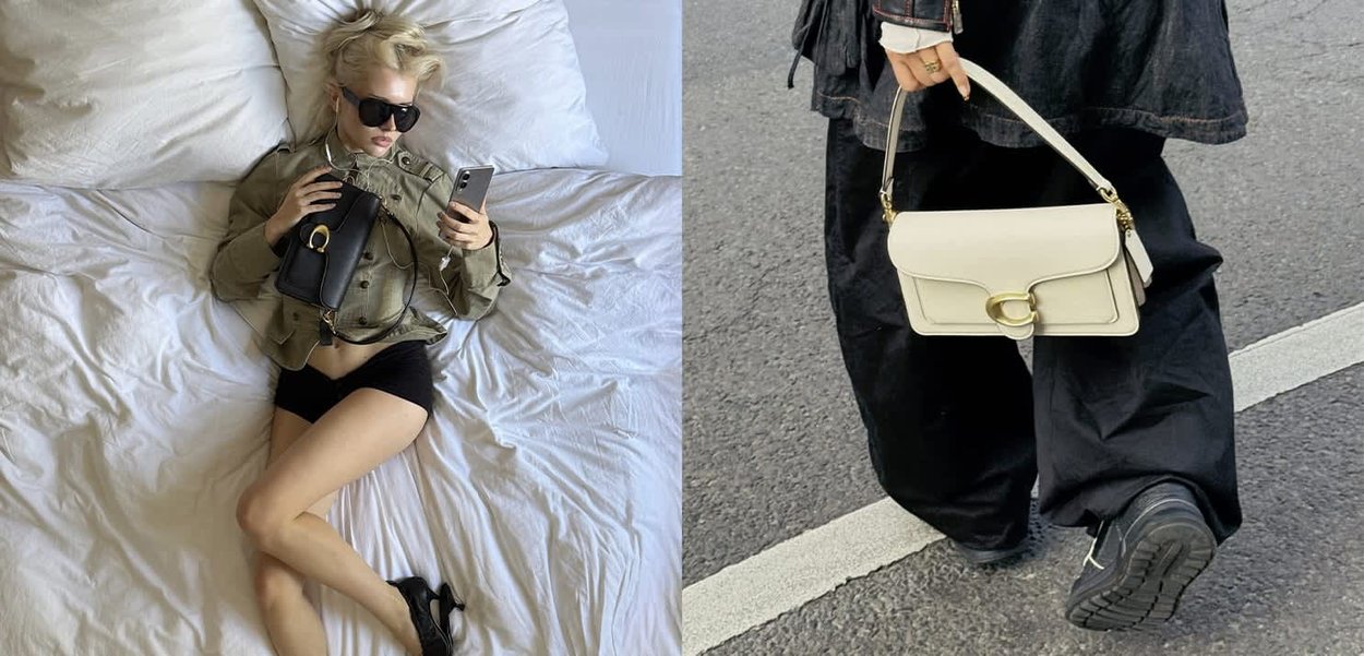 Black and white handbags on a bed with a crumpled white duvet, featuring a solid-color design, smooth textures, and minimal hardware details.