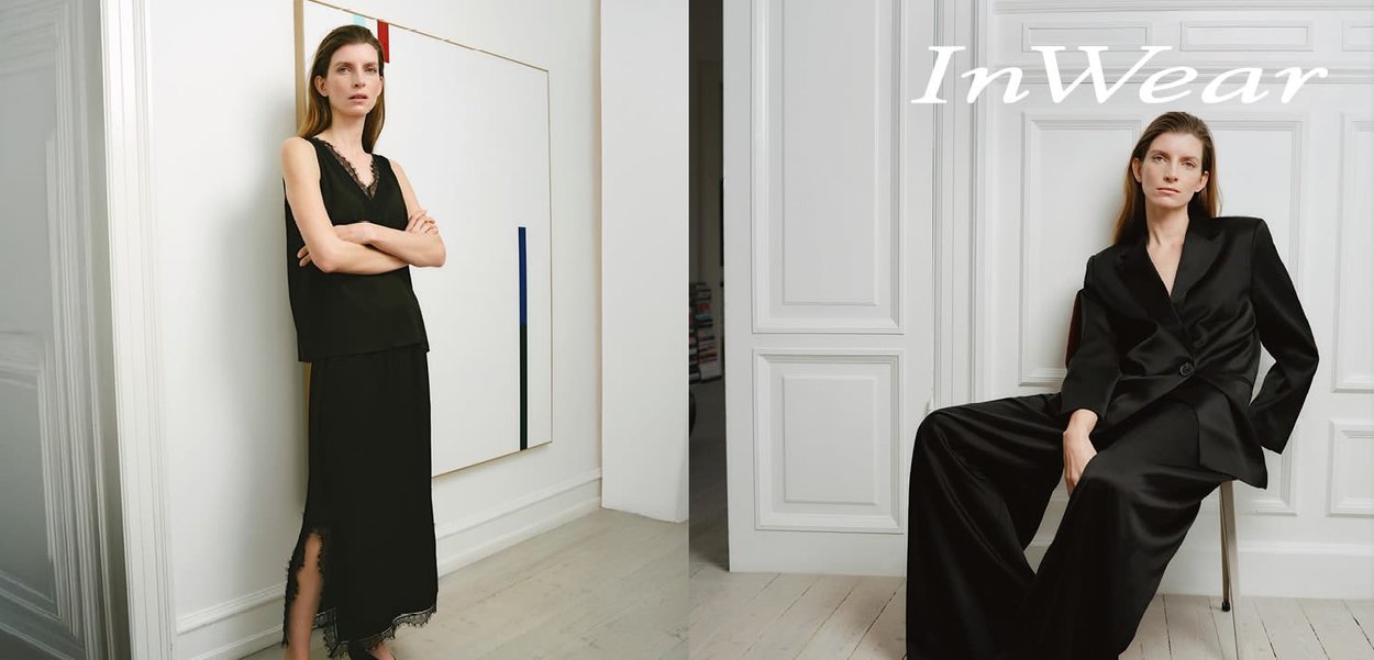 Schwarzes ärmelloses Seidentop mit Spitzensaum, kombiniert mit einem passenden schwarzen Maxirock links; ein taillierter schwarzer Anzug mit weit geschnittenen Hosen rechts.