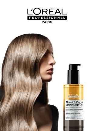 L'Oréal Professionnel Absolut Repair Oil Molecular en un frasco transparente con un dispensador negro. La etiqueta presenta texto blanco sobre un fondo negro.