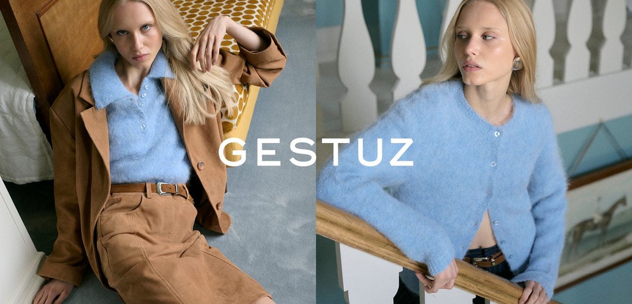 Brown suede blazer and skirt, light blue fluffy sweater with buttons, against a soft blue and cream background with decorative accents.