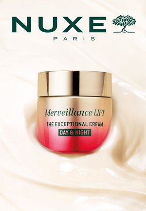 Nuxe Merveillance LIFT cream jar features a gradient design from gold to pink, with green text. Smooth texture with a metallic lid.