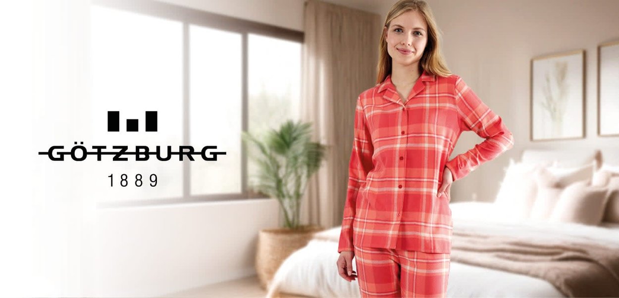 Red plaid pajama set with a button-up shirt and matching pants. Made of soft fabric, featuring a classic check pattern and a comfortable fit.