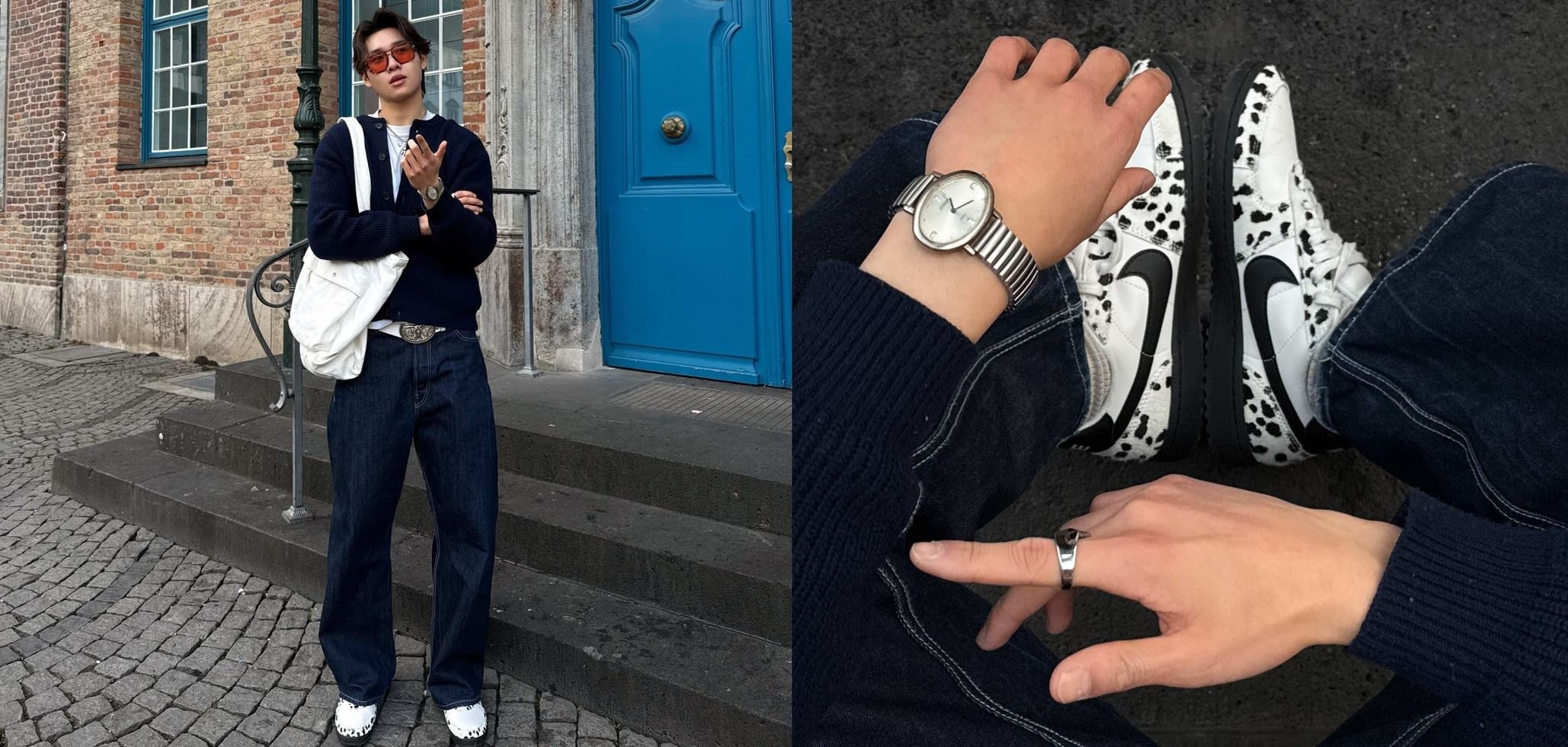 White Nike sneakers with black speckles, dark blue oversized sweater, denim jeans, silver watch, and a white shoulder bag.