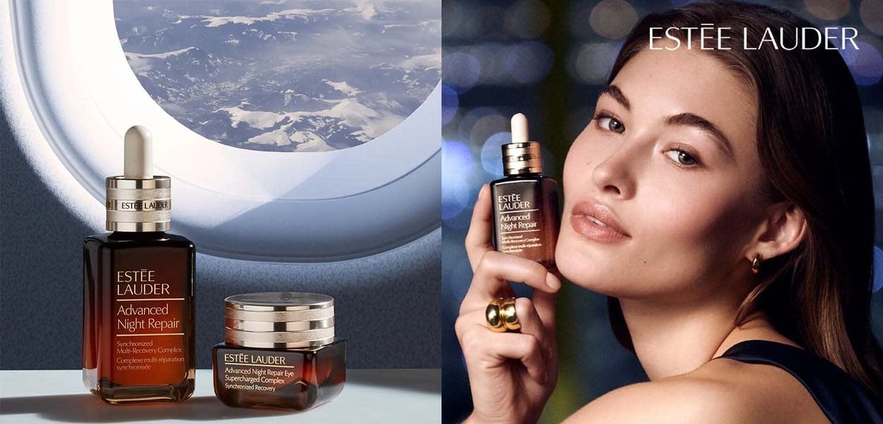 Deux produits de soin Advanced Night Repair d'Estée Lauder, présentant des flacons en verre sombre avec des bouchons compte-gouttes, exposés sur un fond flou.