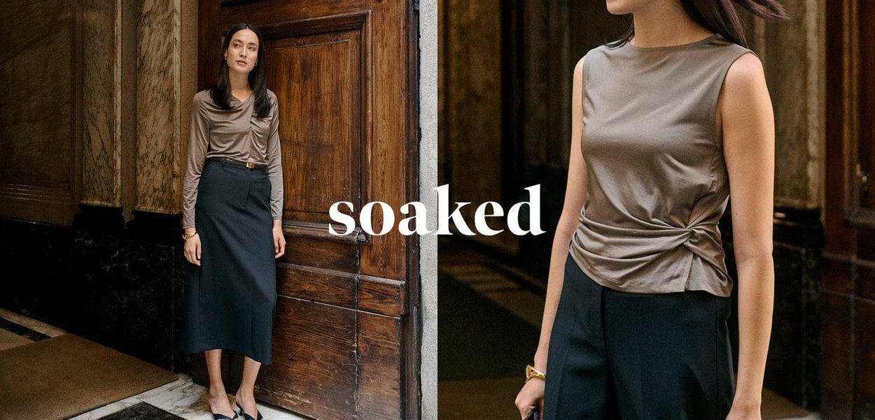 Bronzefarbene, taillierte Bluse mit drapiertem Design und Drehdetail, kombiniert mit einem hoch sitzenden, schwarzen Bleistiftrock. Glatte Textur; minimalistischer Stil.