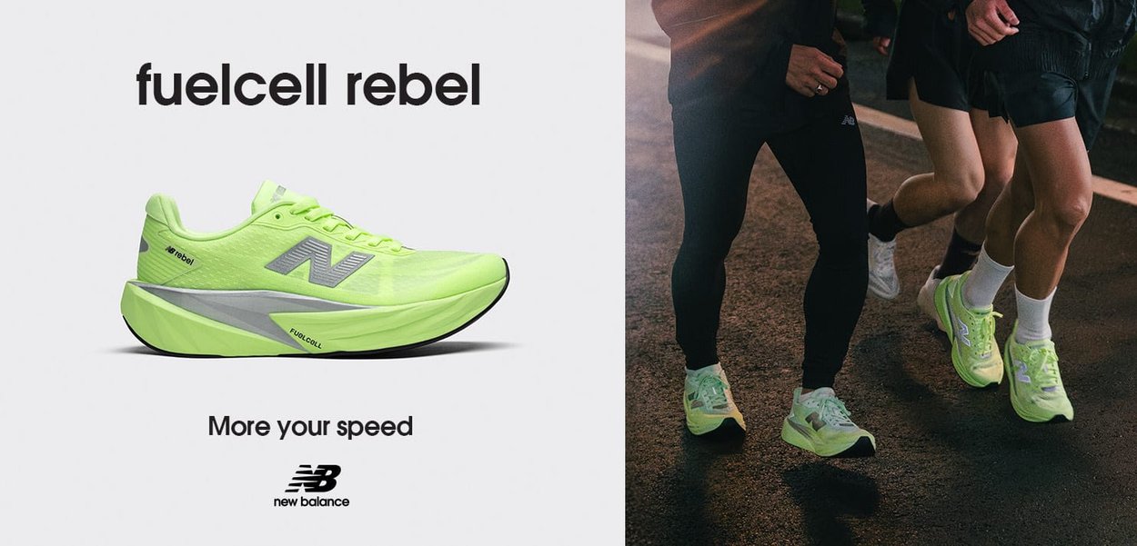 Leichter neongrüner Laufschuh mit Mesh-Obermaterial, reflektierenden Akzenten und dämpfendem Design. Mit New Balance-Logo.