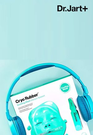 Dr. Jart+ Cryo Rubber koelmaskerset met een turquoise doos met een gemodelleerd gezichtontwerp en een turquoise applicator.