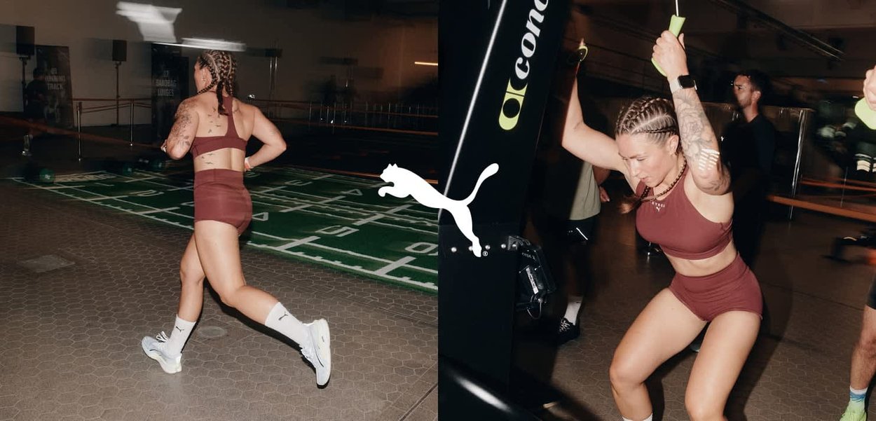 Kobieta z warkoczykami, ubrana w bordowy strój sportowy, biega i ćwiczy z gumami oporowymi w wewnętrznej siłowni z logo Pumy.