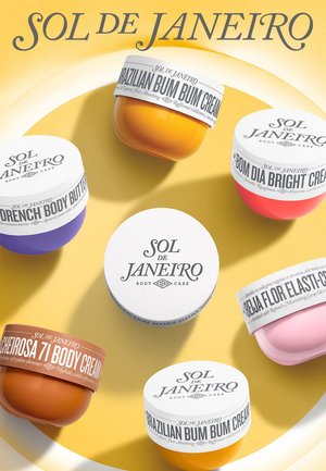 Kremy do pielęgnacji ciała Sol de Janeiro w okrągłych, kolorowych słoiczkach: pomarańczowym, różowym, lawendowym i białym, z etykietami z czarnym tekstem na żółtym tle.