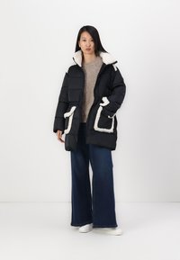 UGG AMAL PLUSHSEAM PUFFER COAT - Winter coat - black - Zalando 