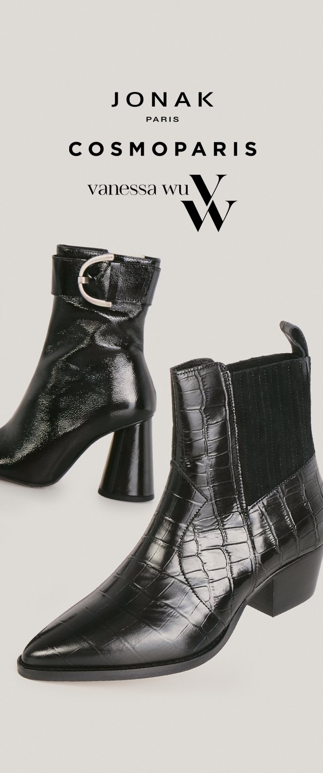 Zwarte enkellaarsjes met een puntige neus en een getextureerd krokodillenpatroon. Heeft een blokhak, elastische zijkant en een gespdetail op een riempje.