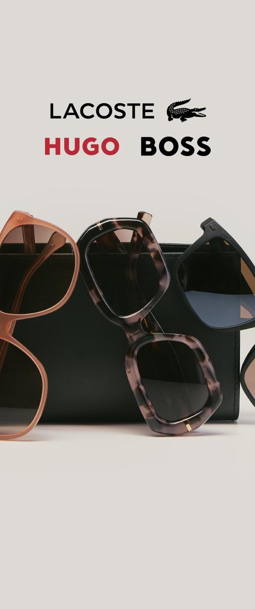 Trois paires de lunettes de soleil de créateurs dans différents styles et couleurs, exposées avec un étui noir et les logos des marques Lacoste, Hugo, Boss au-dessus.