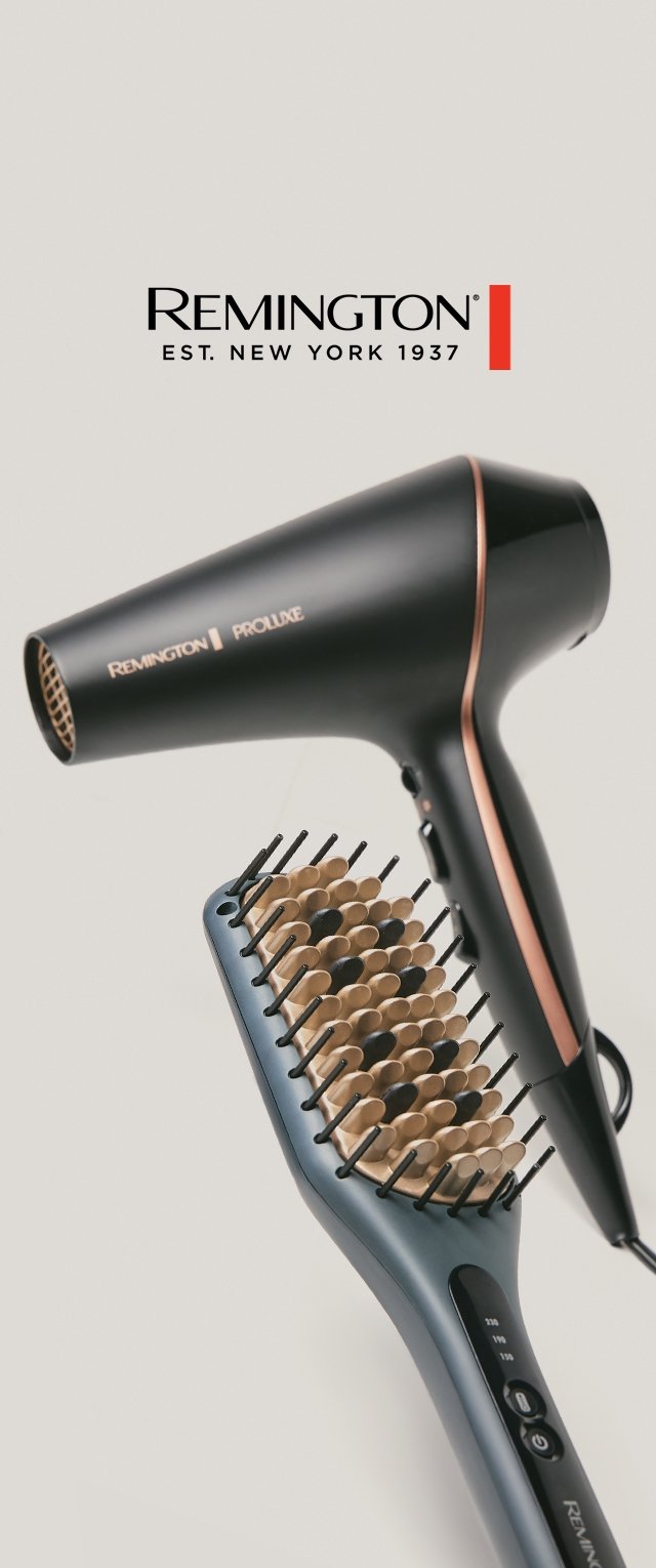 Secador de pelo Remington Proluxe en negro y oro rosa, junto a un cepillo de pelo negro con cerdas de madera, sobre un fondo claro.