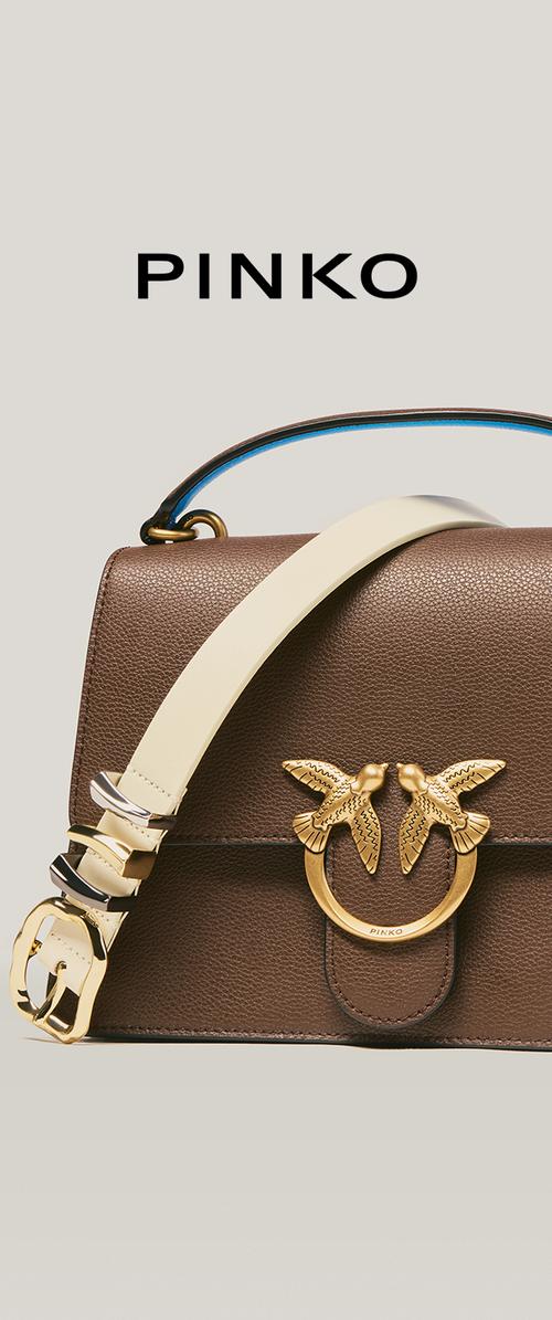 Brown leather Pinko handbag with cream shoulder strap, gold bird-shaped clasp, and gold buckle, shown against a light background.