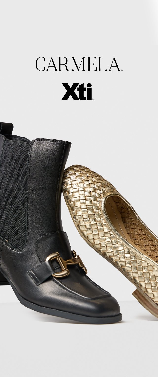 Zwarte leren enkellaars met gouden gespdetail en elastische zijpanelen naast een metallic gouden gevlochten flatschoen met een ronde neus.