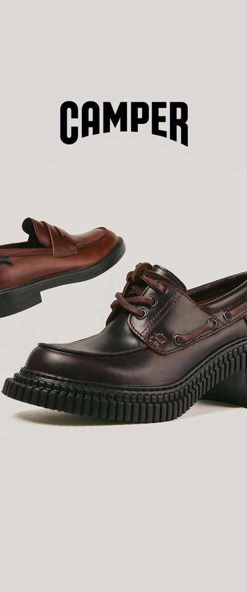 Two pairs of Camper shoes: one in dark brown leather with laces and eyelets, the other in burgundy with a smooth design and textured sole.