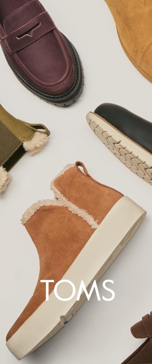 Assorted TOMS shoes featuring suede and leather materials, in colors like brown, black, green, and burgundy, with varied designs and textures.