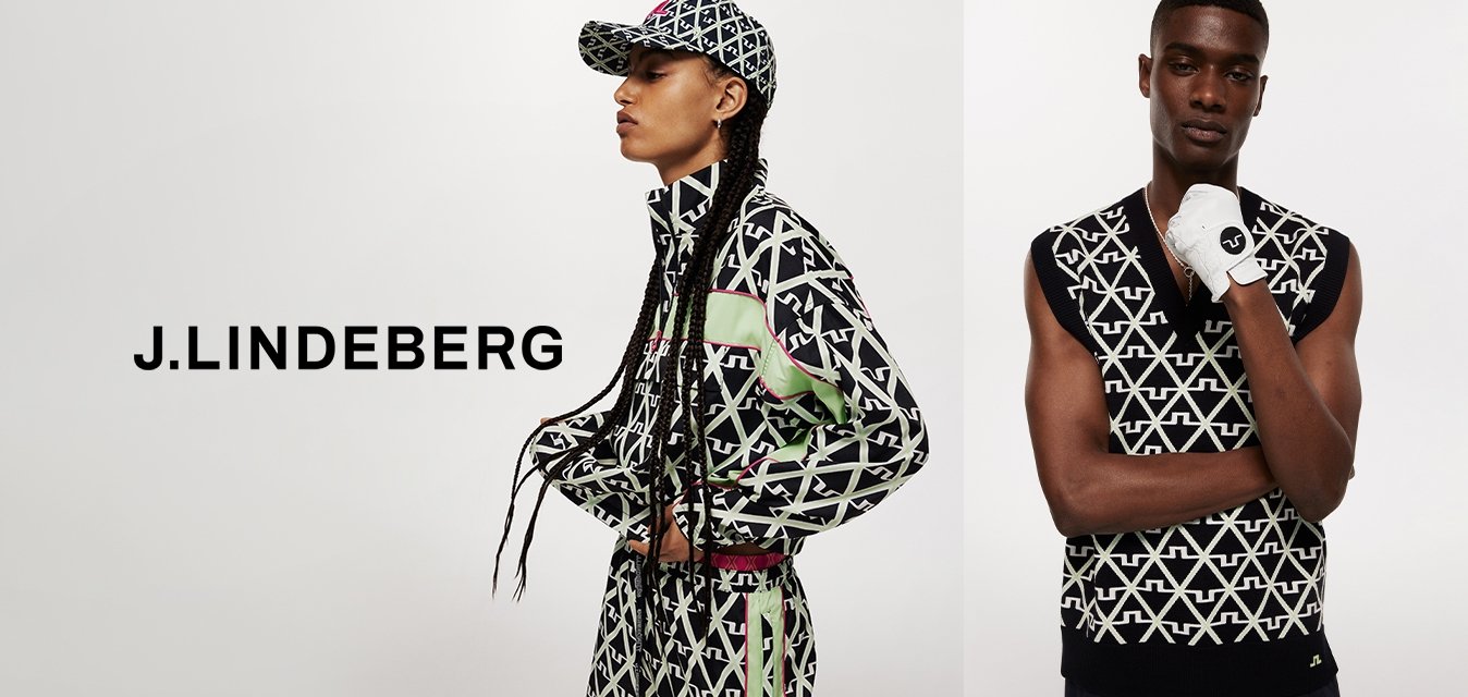 Sportovní oblečení s výrazným geometrickým vzorem v černé, bílé a zelené barvě. Obsahuje bundu na zip a tílko bez rukávů s doplňky.