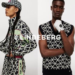 Sportovní oblečení s výrazným geometrickým vzorem v černé, bílé a zelené barvě. Obsahuje bundu na zip a tílko bez rukávů s doplňky.