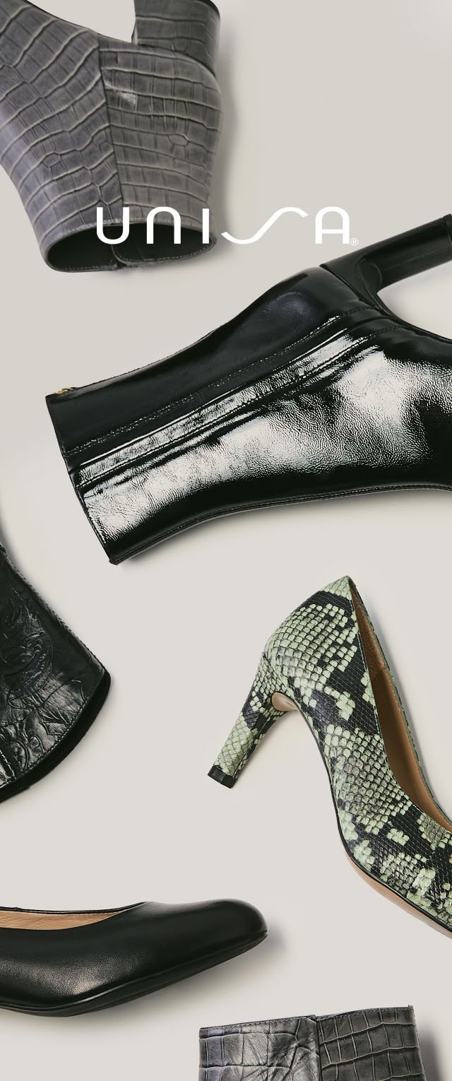 Schoenenassortiment met een grijze pump met krokodillenreliëf, een zwarte glanzende leren laars, een zwarte ballerina en een groene hak met slangendessin.