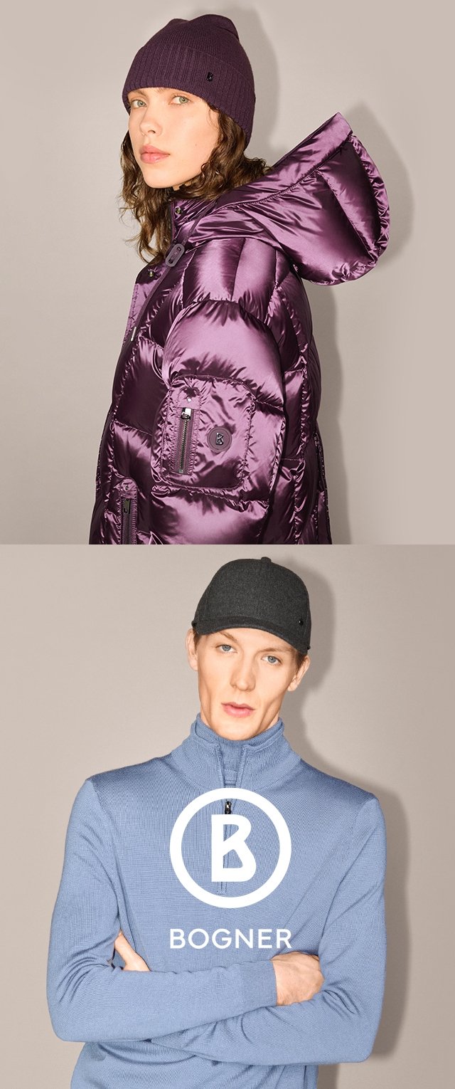 Lila Puffjacke mit Kapuze und Reißverschlusstasche, kombiniert mit einer passenden Mütze; darunter ein hellblaues Sweater mit Reißverschluss und Logo.