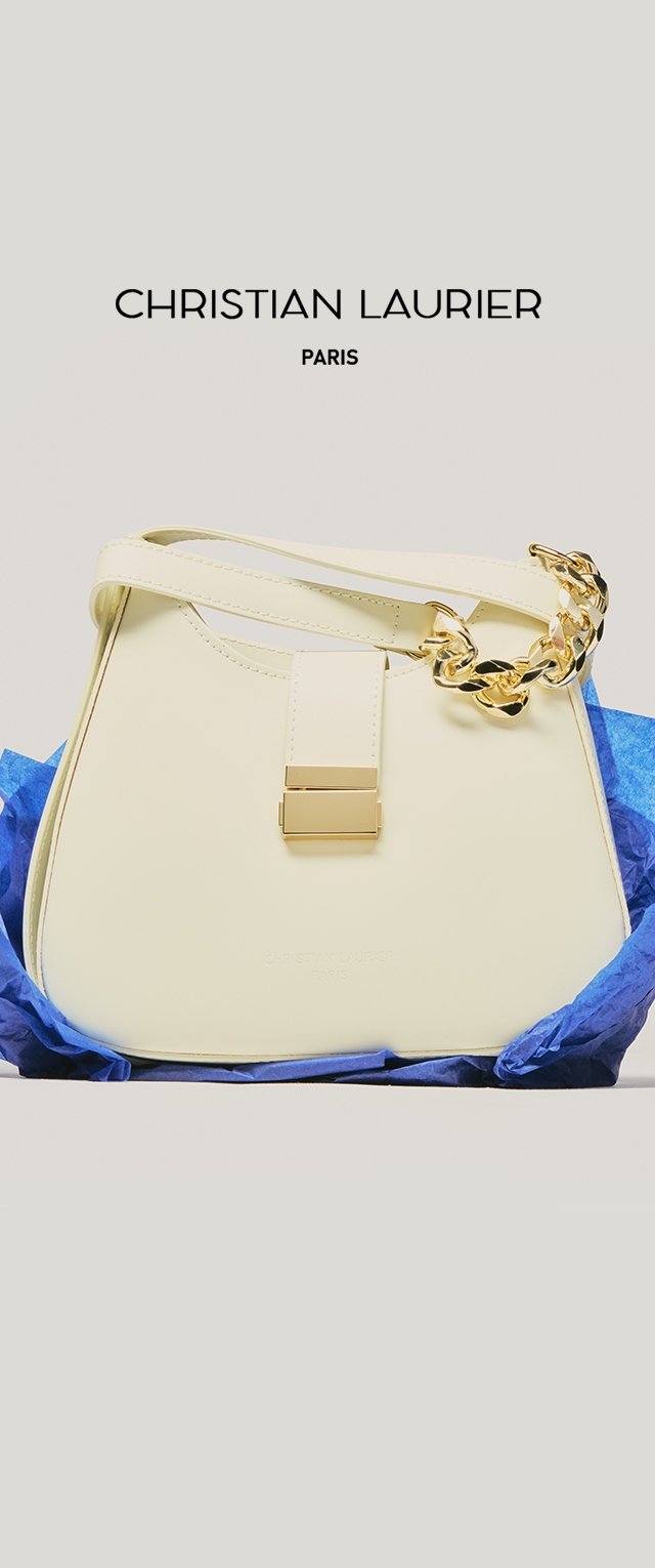 Bolso de cuero crema con detalle de cadena dorada y cierre, sobre papel de seda azul, con la marca Christian Laurier Paris encima.