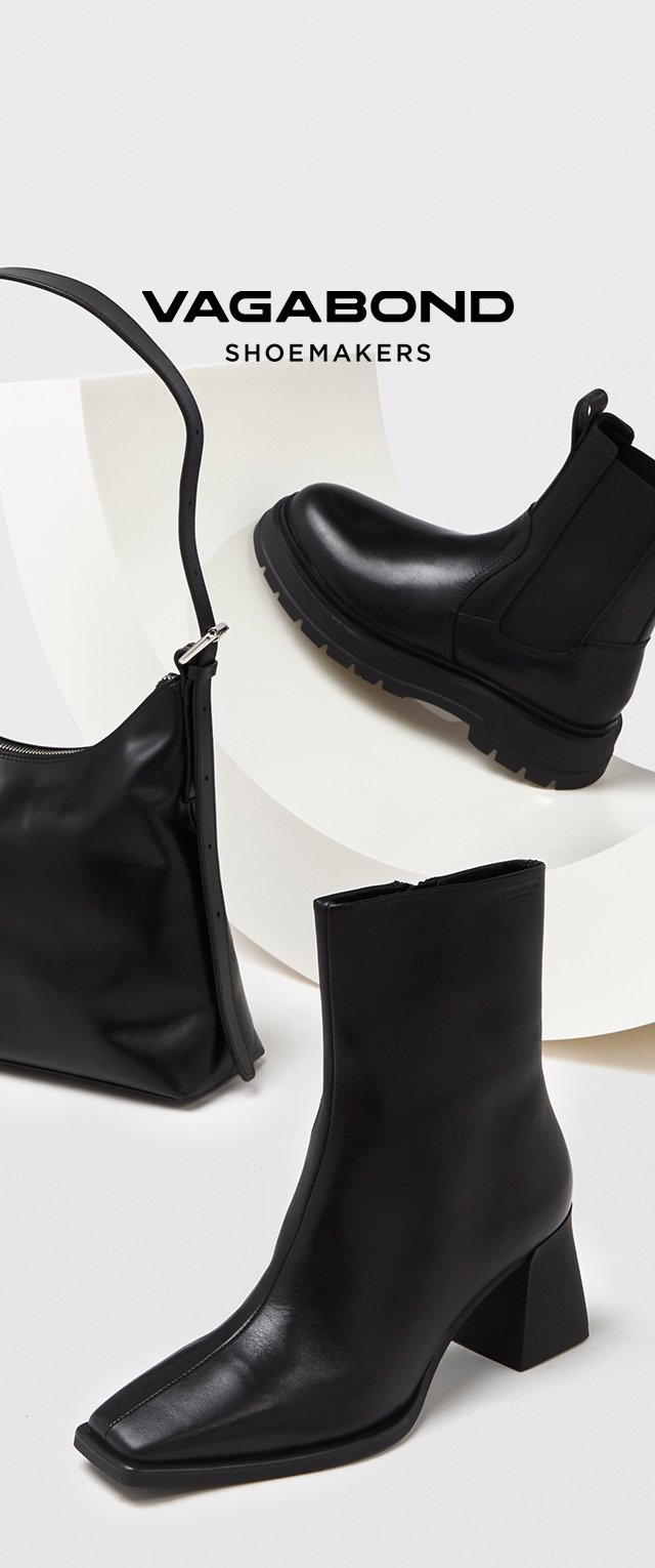 Schwarze Lederstiefeletten mit rechteckiger Spitze und robustem Absatz, begleitet von einer schwarzen Lederhandtasche. Glatte Textur mit minimalen Verzierungen.