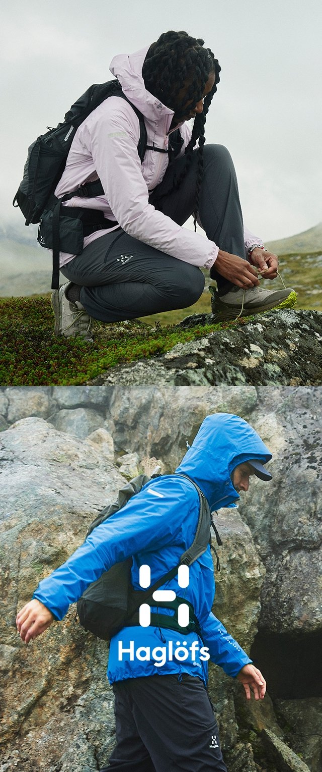 Two outdoor individuals: one in a light pink jacket and dark pants crouching, and another in a blue jacket walking, both in rugged terrain.