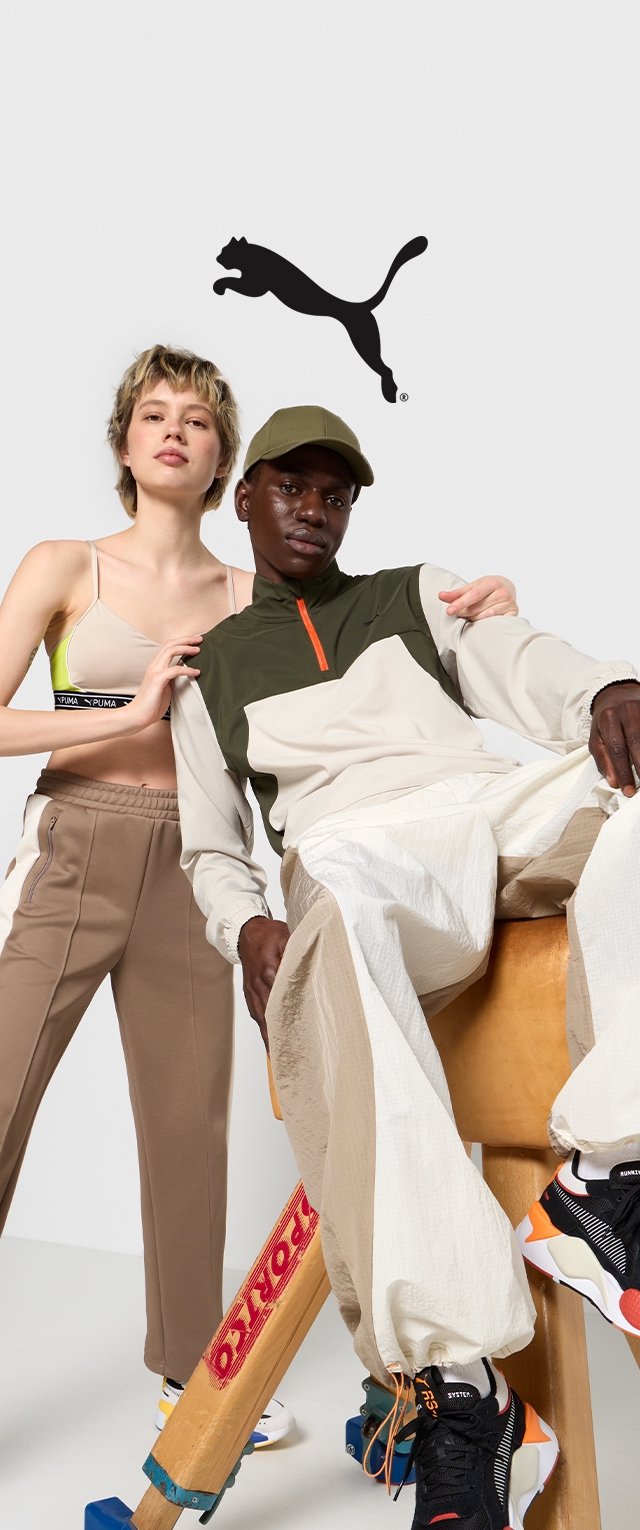 La ropa de marca Puma incluye una chaqueta con cremallera en color beige y oliva, pantalones marrones y zapatillas coloridas. Un logo se muestra encima de los modelos.